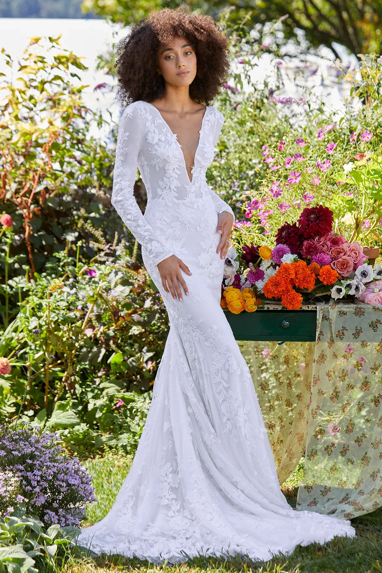 A model wears the Ines Di Santo Marianna dress in a garden